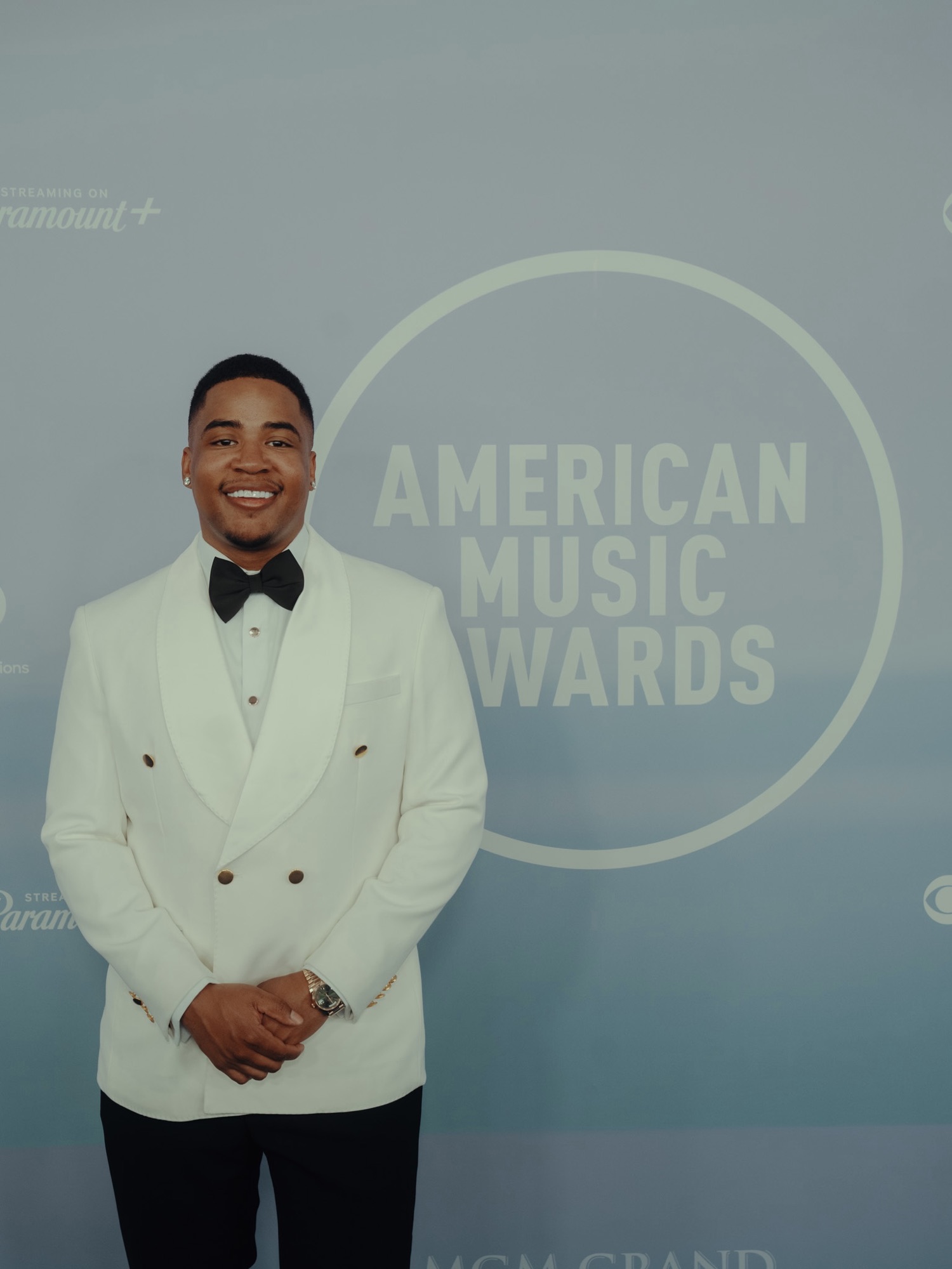 Turbo The Great (Chandler A. Great), Grammy-nominated music producer, on the red carpet at the 2026 American Music Awards